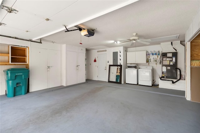 5057 Maui Cir Unit 15, Orlando, FL 32808 - garage with a garage door opener, washing machine and clothes dryer, heating unit, a ceiling fan, and electric panel