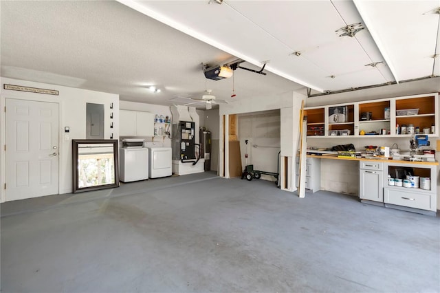 5057 Maui Cir Unit 15, Orlando, FL 32808 - garage with electric panel, a garage door opener, washing machine and clothes dryer, and water heater