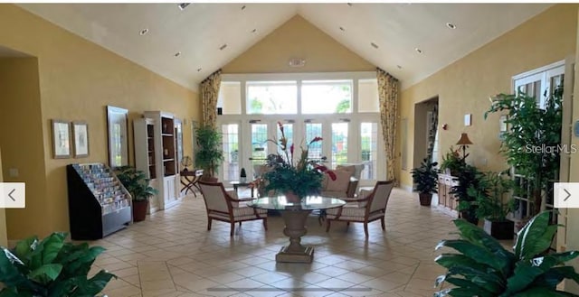 4019 Venetian Bay Dr Unit 107, Kissimmee, FL 34741 - dining area featuring high vaulted ceiling and french doors