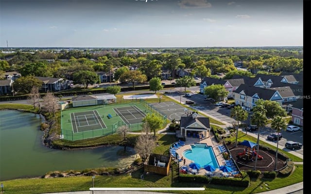 4019 Venetian Bay Dr Unit 107, Kissimmee, FL 34741 - drone / aerial view of a pool and a nearby body of water