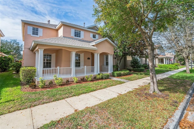 7184 Maleberry Run, Winter Garden, FL 34787 - view of front of house with a porch, stucco siding, roof with shingles, and a front yard