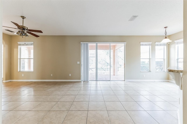 7184 Maleberry Run, Winter Garden, FL 34787 - unfurnished room with light tile patterned floors, plenty of natural light, and a ceiling fan