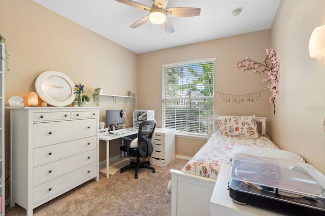 12868 Holdenbury Ln, Windermere, FL 34786 - bedroom featuring light colored carpet, a desk, and a ceiling fan