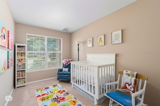12868 Holdenbury Ln, Windermere, FL 34786 - bedroom with carpet floors and a nursery area