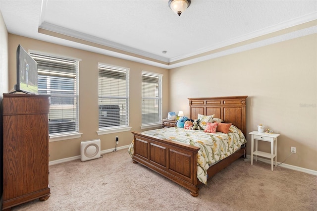 12868 Holdenbury Ln, Windermere, FL 34786 - bedroom with light colored carpet, multiple windows, ornamental molding, and a tray ceiling