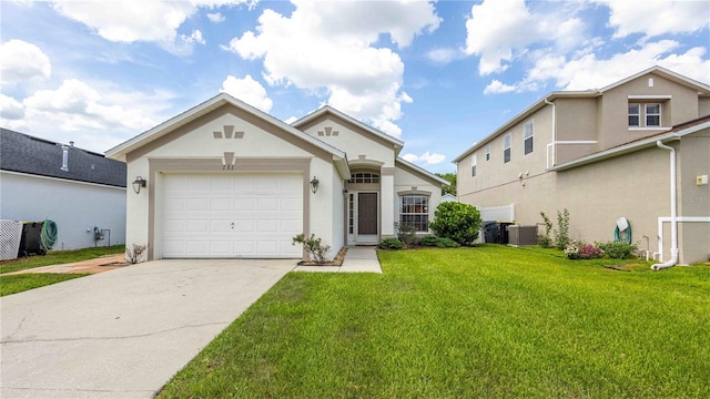 131 Sonja Cir, Davenport, FL 33897 - view of front of house featuring driveway, a front lawn, stucco siding, and a garage