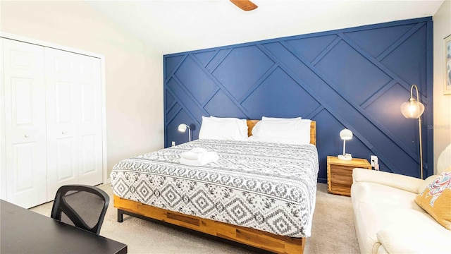 131 Sonja Cir, Davenport, FL 33897 - carpeted bedroom featuring a decorative wall, vaulted ceiling, a closet, and a ceiling fan