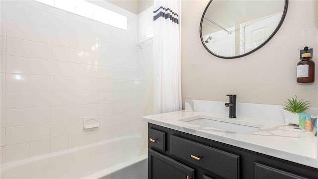 131 Sonja Cir, Davenport, FL 33897 - full bathroom featuring shower / bath combo with shower curtain and vanity