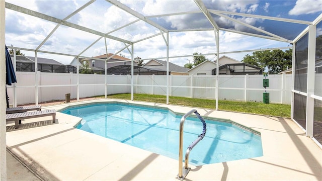 131 Sonja Cir, Davenport, FL 33897 - view of swimming pool with a fenced backyard, a patio, and a lanai