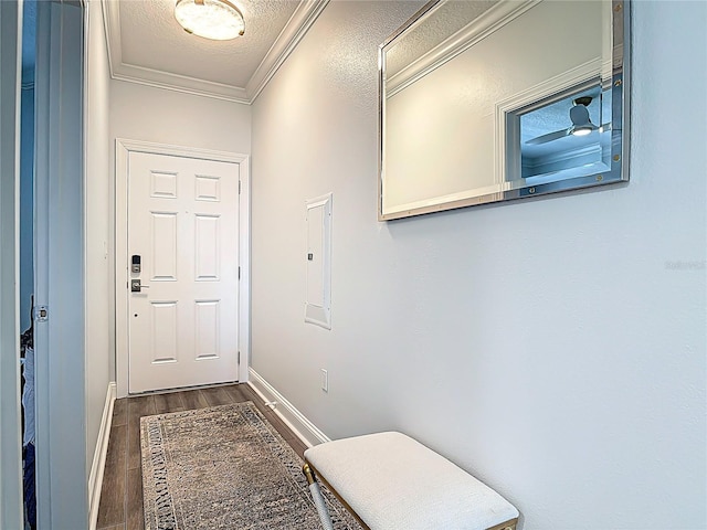 60 Surfview Dr Unit 308, Palm Coast, FL 32137 - entryway featuring dark wood-type flooring, crown molding, electric panel, and a textured ceiling