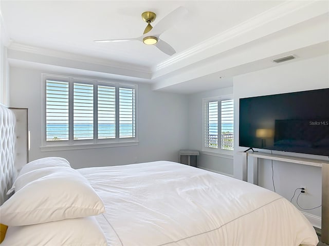 60 Surfview Dr Unit 308, Palm Coast, FL 32137 - bedroom with crown molding and ceiling fan