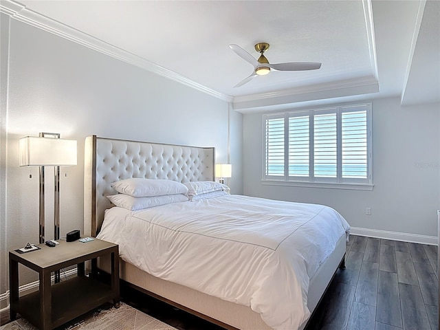 60 Surfview Dr Unit 308, Palm Coast, FL 32137 - bedroom featuring dark wood-style floors, crown molding, and a ceiling fan