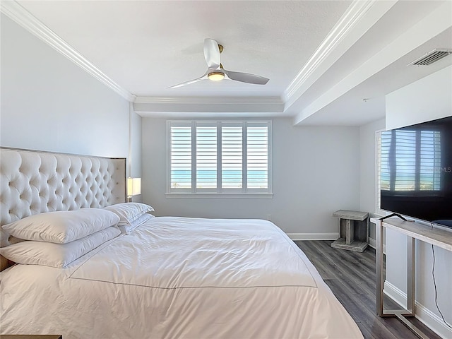 60 Surfview Dr Unit 308, Palm Coast, FL 32137 - bedroom with crown molding, dark wood finished floors, and ceiling fan