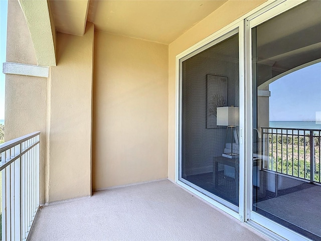 60 Surfview Dr Unit 308, Palm Coast, FL 32137 - balcony featuring a water view