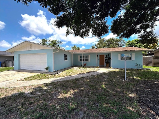 2813 21st Ave W, Bradenton, FL 34205 - ranch-style home with an attached garage, driveway, and stucco siding
