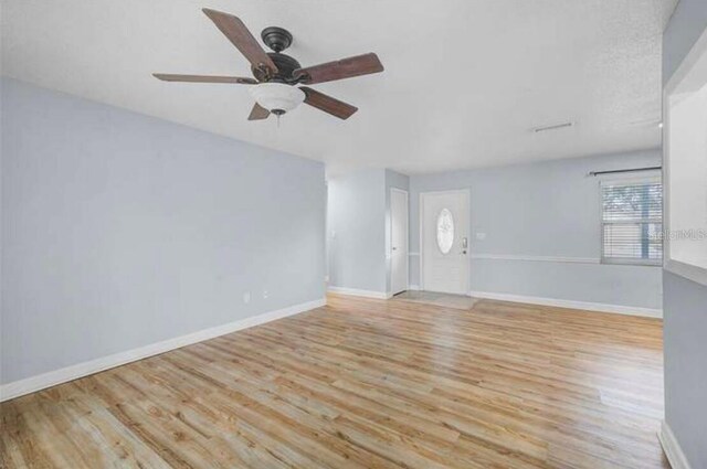 2813 21st Ave W, Bradenton, FL 34205 - spare room with wood finished floors and a ceiling fan