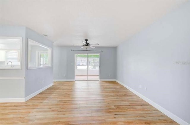 2813 21st Ave W, Bradenton, FL 34205 - unfurnished room featuring ceiling fan and light wood-style flooring