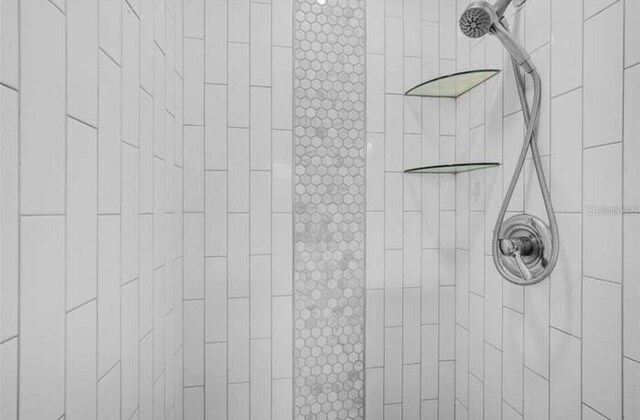 2813 21st Ave W, Bradenton, FL 34205 - bathroom view of tiled shower and a package area