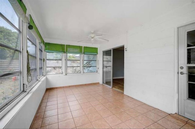 2813 21st Ave W, Bradenton, FL 34205 - unfurnished sunroom featuring healthy amount of natural light and tile patterned floors