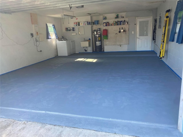 2813 21st Ave W, Bradenton, FL 34205 - garage with separate washer and dryer, water heater, a garage door opener, and a workshop area