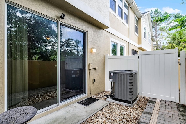 14242 Desert Haven St Unit Ge, Windermere, FL 34786 - entrance to property featuring a gate and stucco siding