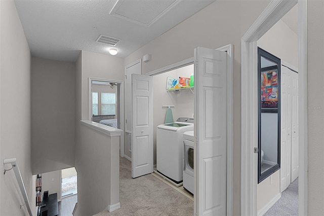 14242 Desert Haven St Unit Ge, Windermere, FL 34786 - washroom featuring separate washer and dryer and light colored carpet
