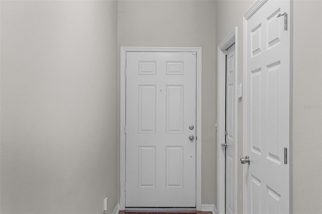 14242 Desert Haven St Unit Ge, Windermere, FL 34786 - doorway to outside with baseboards