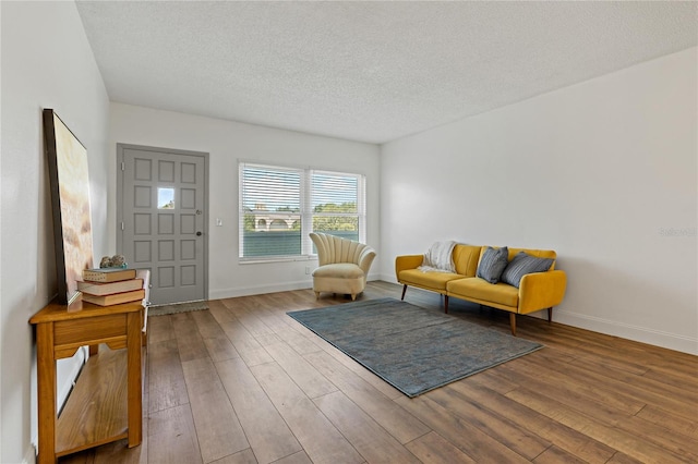 2257 World Parkway Blvd W Unit 61, Clearwater, FL 33763 - foyer with wood-type flooring and a textured ceiling