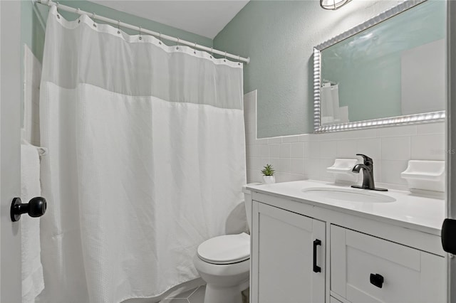 2257 World Parkway Blvd W Unit 61, Clearwater, FL 33763 - full bathroom featuring vanity, tile walls, and a shower with shower curtain