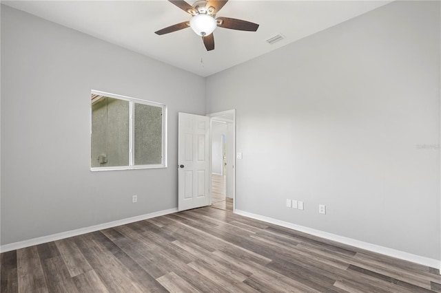 17032 Winners Cir, Odessa, FL 33556 - empty room featuring wood finished floors and a ceiling fan