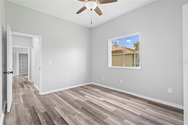 17032 Winners Cir, Odessa, FL 33556 - unfurnished room with ceiling fan and wood finished floors