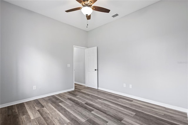 17032 Winners Cir, Odessa, FL 33556 - spare room featuring wood finished floors and a ceiling fan