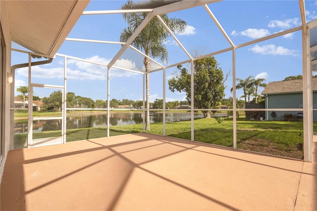 17032 Winners Cir, Odessa, FL 33556 - unfurnished sunroom with a water view