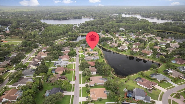 17032 Winners Cir, Odessa, FL 33556 - aerial overview of property's location with a large body of water and nearby suburban area