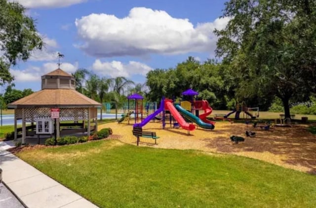 17032 Winners Cir, Odessa, FL 33556 - community playground with a gazebo and a lawn