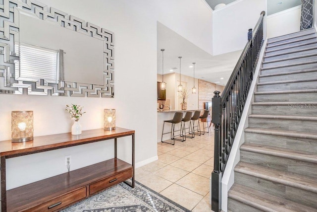 8901 Rhodes St, Kissimmee, FL 34747 - stairs featuring tile patterned flooring and recessed lighting