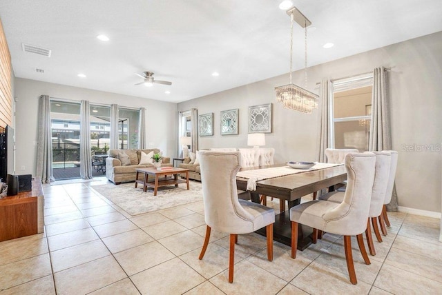 8901 Rhodes St, Kissimmee, FL 34747 - dining room featuring a chandelier, ceiling fan, light tile patterned floors, and recessed lighting