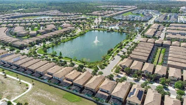 8901 Rhodes St, Kissimmee, FL 34747 - aerial view of property's location with nearby suburban area and a large body of water