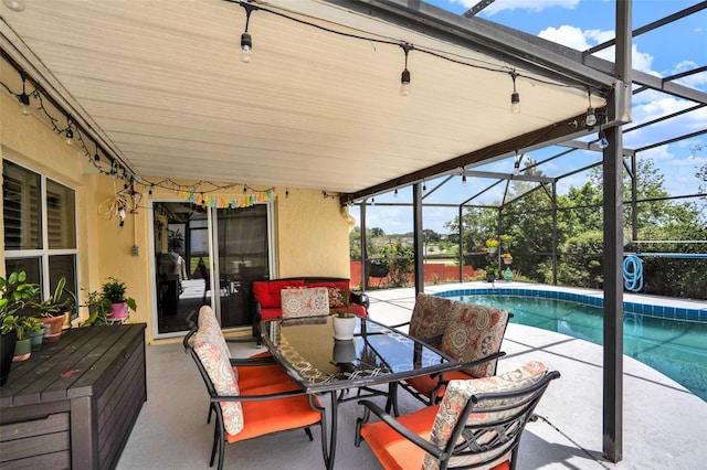 1165 Indian Ridge Trl E, Kissimmee, FL 34747 - sunroom / solarium featuring outdoor dining space