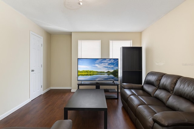 2791 L B Mcleod Rd Unit C, Orlando, FL 32805 - living area featuring dark wood-type flooring and baseboards
