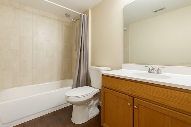 2791 L B Mcleod Rd Unit C, Orlando, FL 32805 - bathroom featuring vanity, shower / tub combo with curtain, and wood finished floors