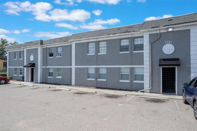 2791 L B Mcleod Rd Unit C, Orlando, FL 32805 - view of building exterior with uncovered parking