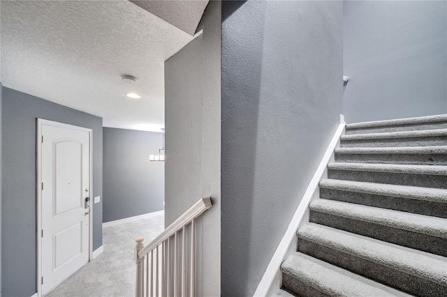 14088 Tarvin St, Orlando, FL 32832 - stairs featuring tile patterned floors and baseboards