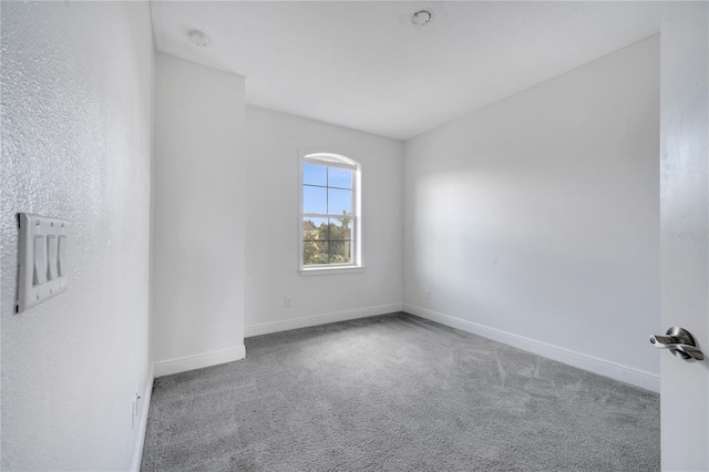 14088 Tarvin St, Orlando, FL 32832 - spare room with carpet flooring and a smoke detector
