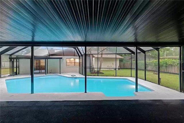 15609 Timberline Dr, Tampa, FL 33624 - swimming pool featuring glass enclosure and a patio area