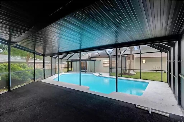 15609 Timberline Dr, Tampa, FL 33624 - swimming pool featuring a patio area and glass enclosure