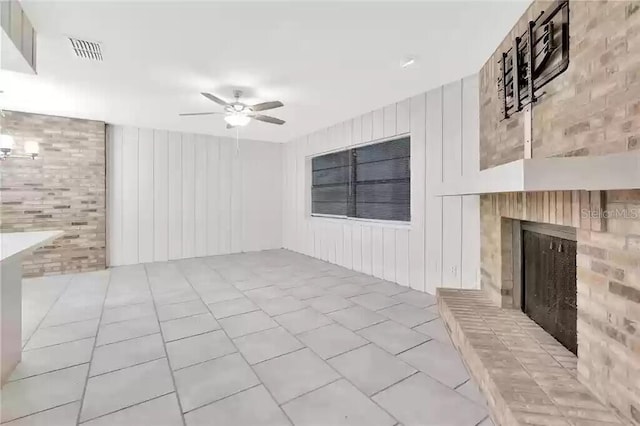 15609 Timberline Dr, Tampa, FL 33624 - unfurnished living room with a brick fireplace, a ceiling fan, and wood walls