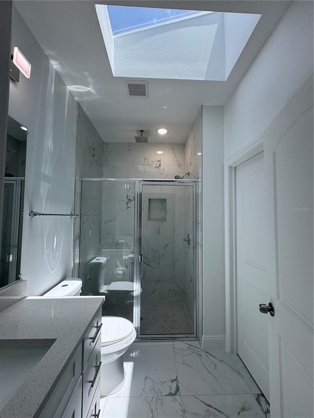 320 W Necho Ave, Lake Alfred, FL 33850 - bathroom with a skylight, vanity, a marble finish shower, and marble finish flooring