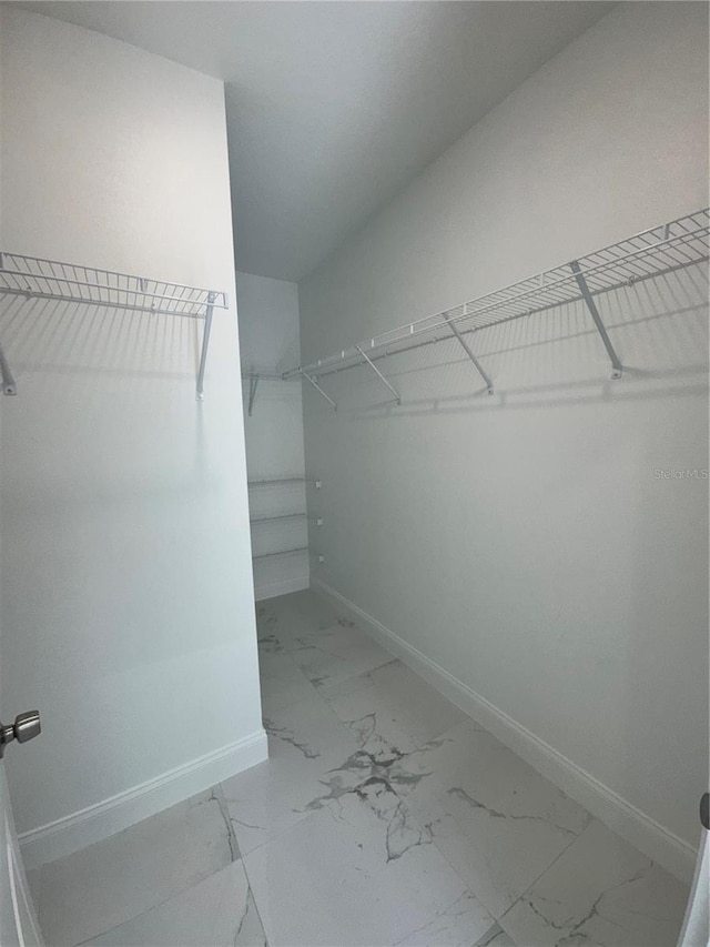 320 W Necho Ave, Lake Alfred, FL 33850 - spacious closet with light marble finish floors