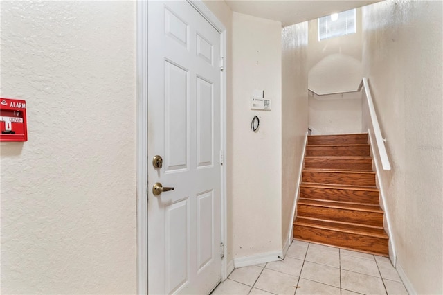 1825 Shadow View Cir Unit 1825, Maitland, FL 32751 - stairway with tile patterned floors and a textured wall